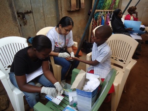 Day 3 RFHD Dr Indu performing HIV  test at site